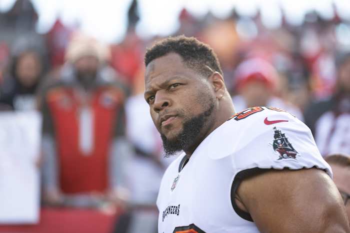 Jan 23, 2022; Tampa, Florida, USA; Tampa Bay Buccaneers defensive end Ndamukong Suh (93) walks onto the field before the game against the Los Angeles Rams during a NFC Divisional playoff football game at Raymond James Stadium. Mandatory Credit: Matt Pendleton-USA TODAY Sports